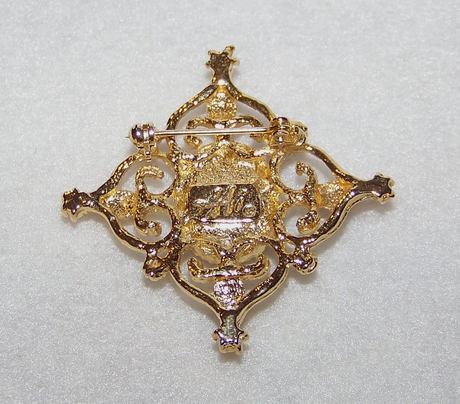 aai brooch